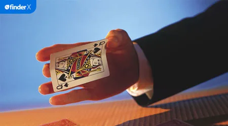 finder-x-holding-a-queen-spades-450x250