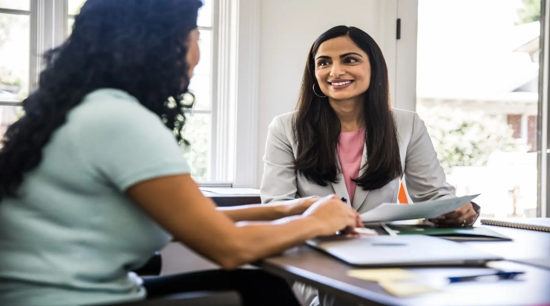 Women in meeting_GettyImages_1800x1000