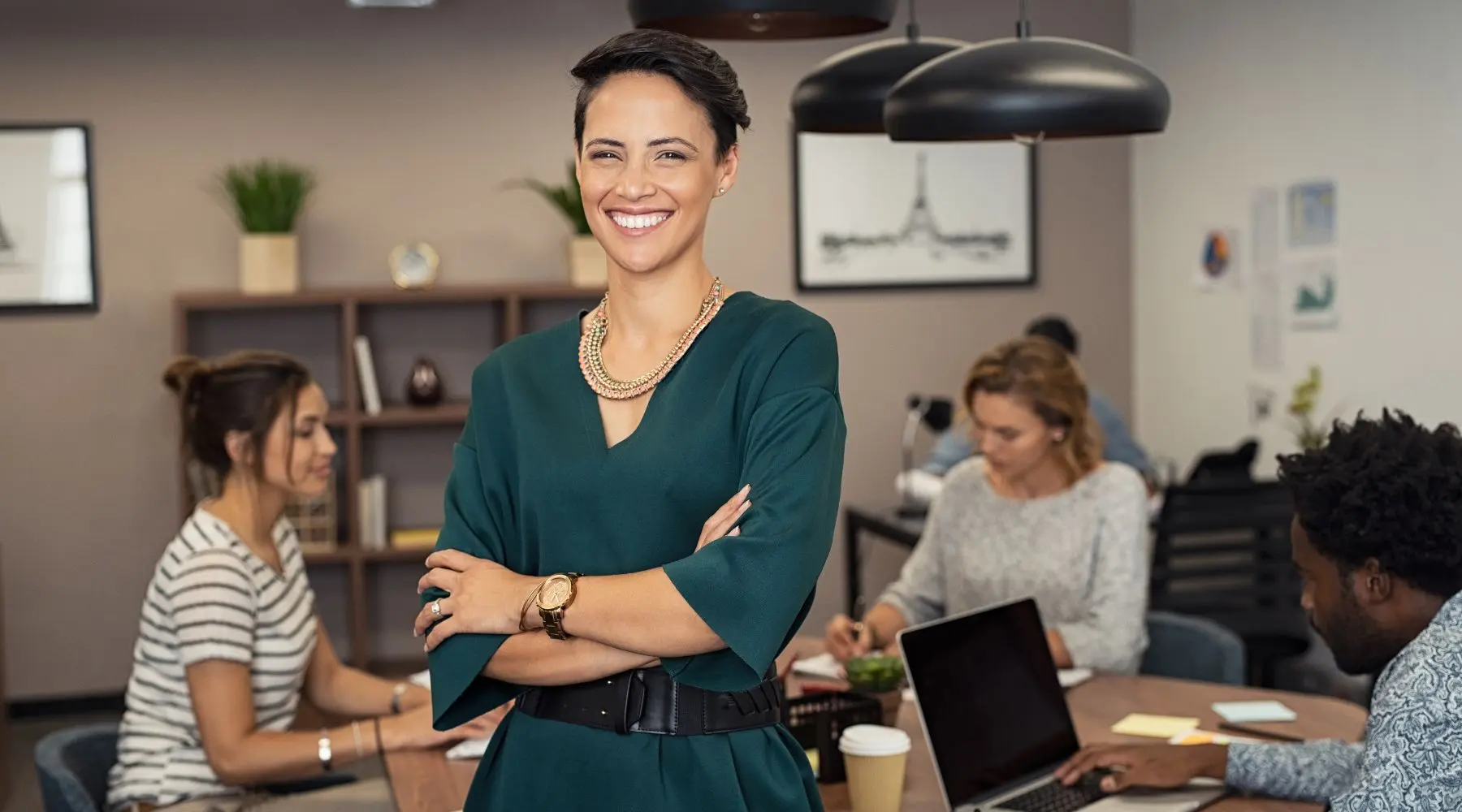 Business_Woman_In_Centre_Of_Office_Canva_1800x1000