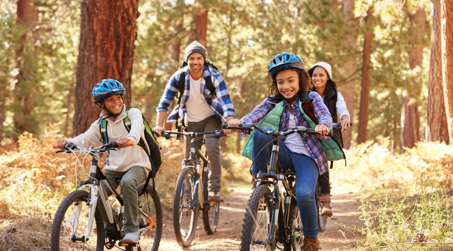 Happy_Family_Cycling_Together_Canva_1800x1000