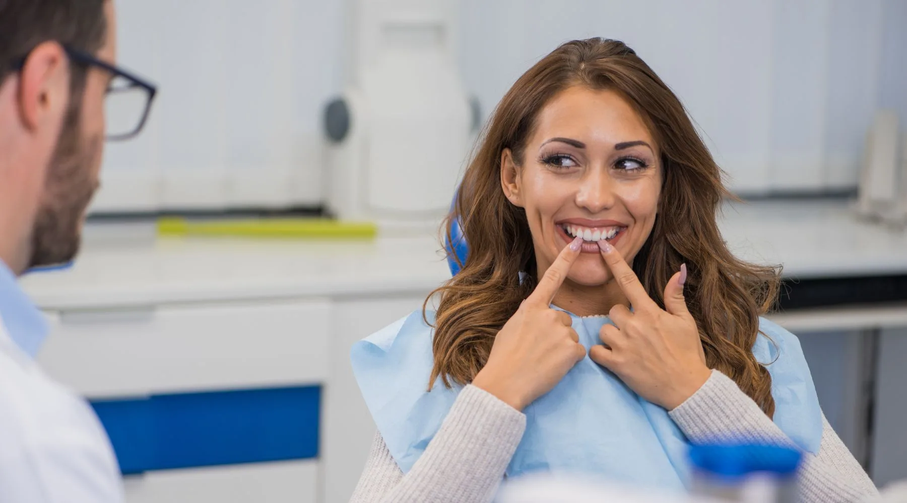 Happy_Woman_At_Dentist_Canva_1800x1000