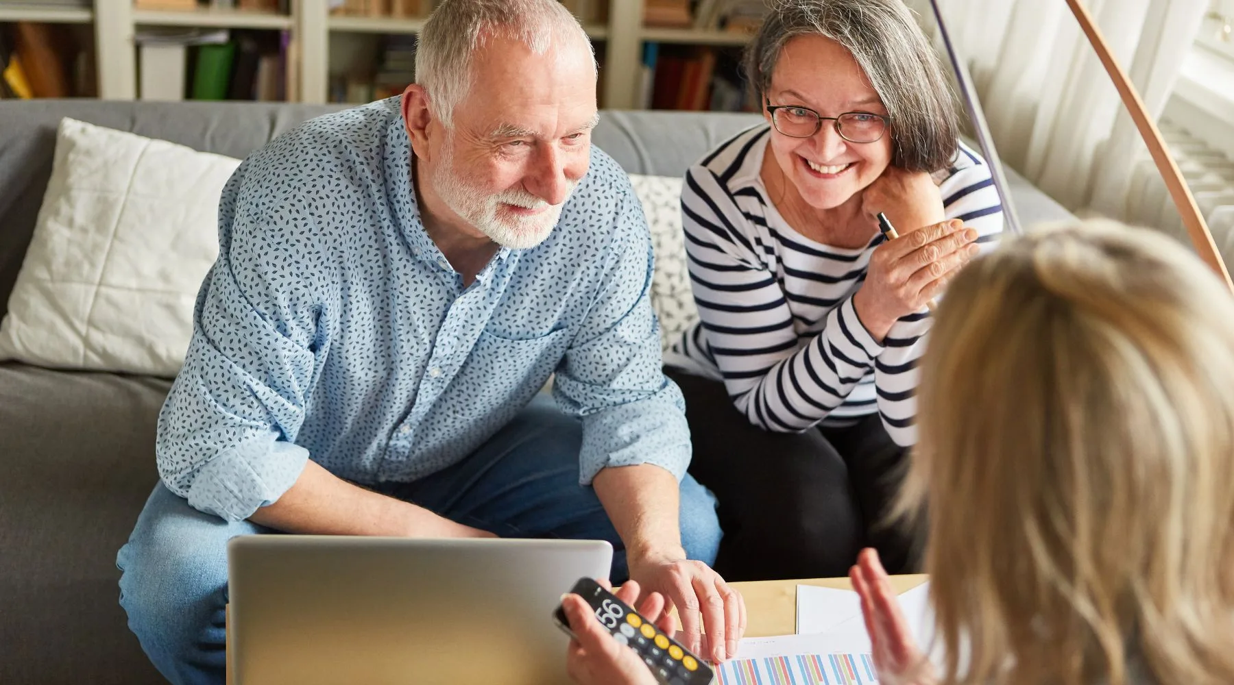 Retirement_Couple_Discussing_Finances_Canva_1800x1000 Retirement_Couple_Discussing_Finances_Canva_1800x1000