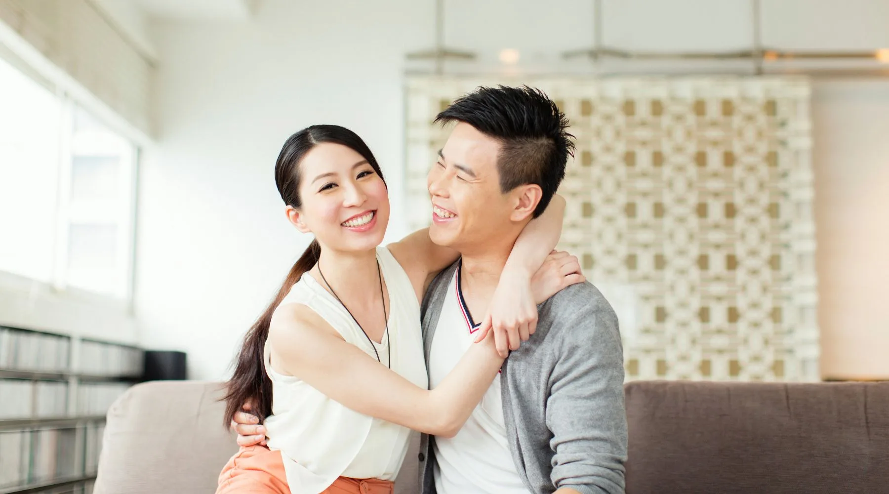 Couple_On_Lounge_Together_Canva_1800x1000 Couple_On_Lounge_Together_Canva_1800x1000