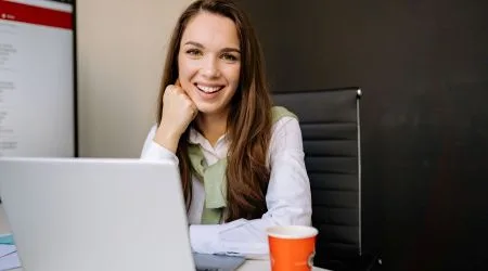 A young woman at her desk 
