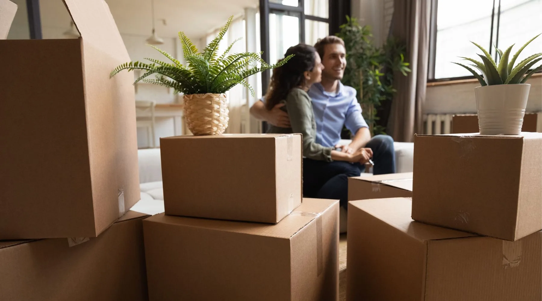 Couple_Moving_Into_New_Home_Canva_1800x1000 Couple_Moving_Into_New_Home_Canva_1800x1000