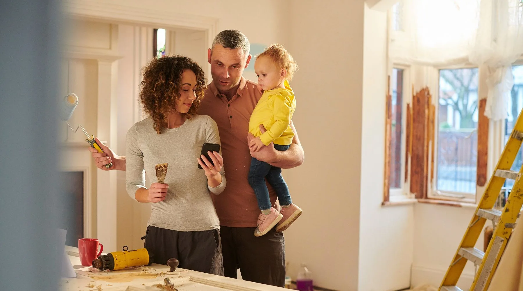 Family_With_Child_Renovating_Home_Together_Canva_1800x1000
