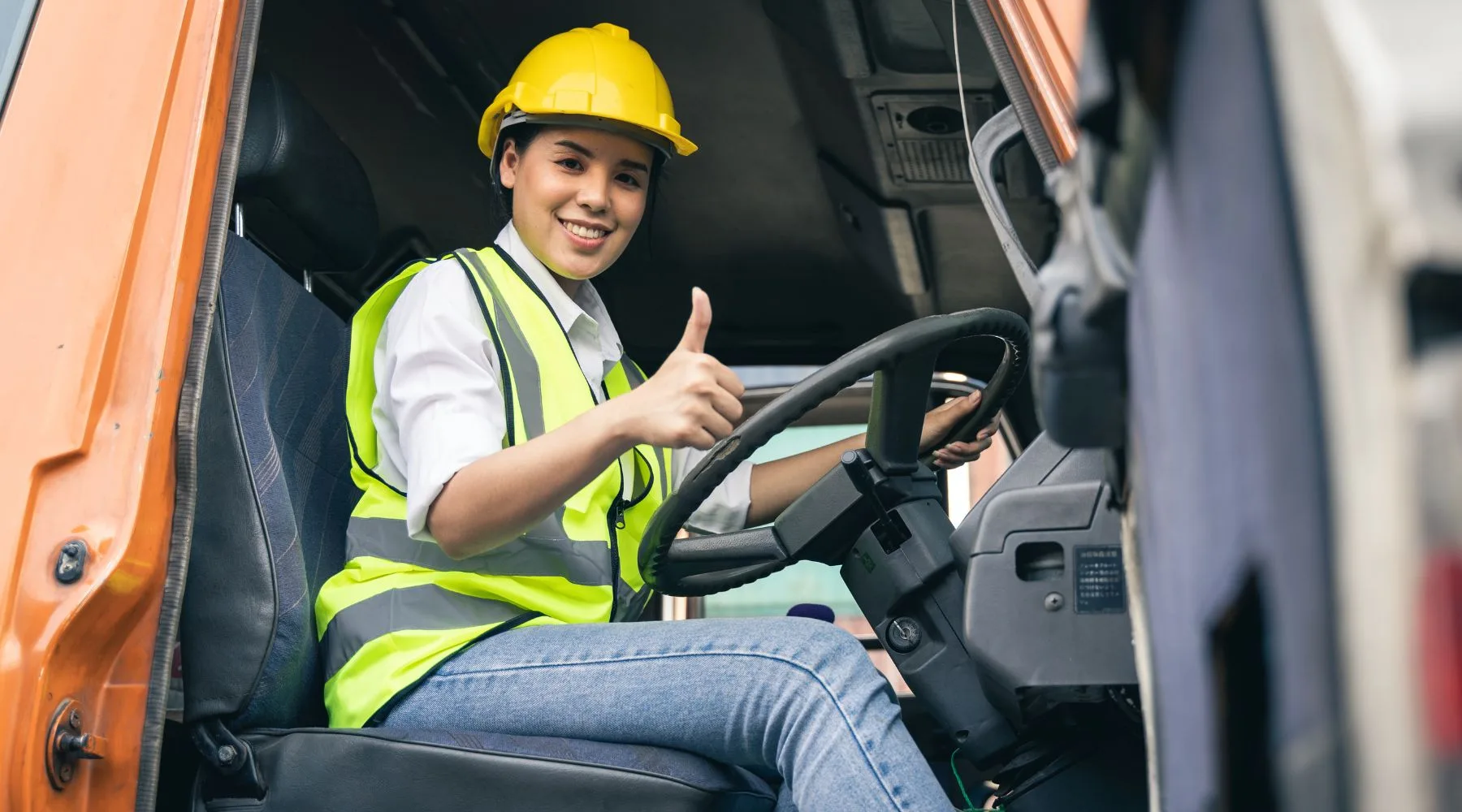 Truck_Driver_Happy_In_Car_Canva_1800x1000 Truck_Driver_Happy_In_Car_Canva_1800x1000