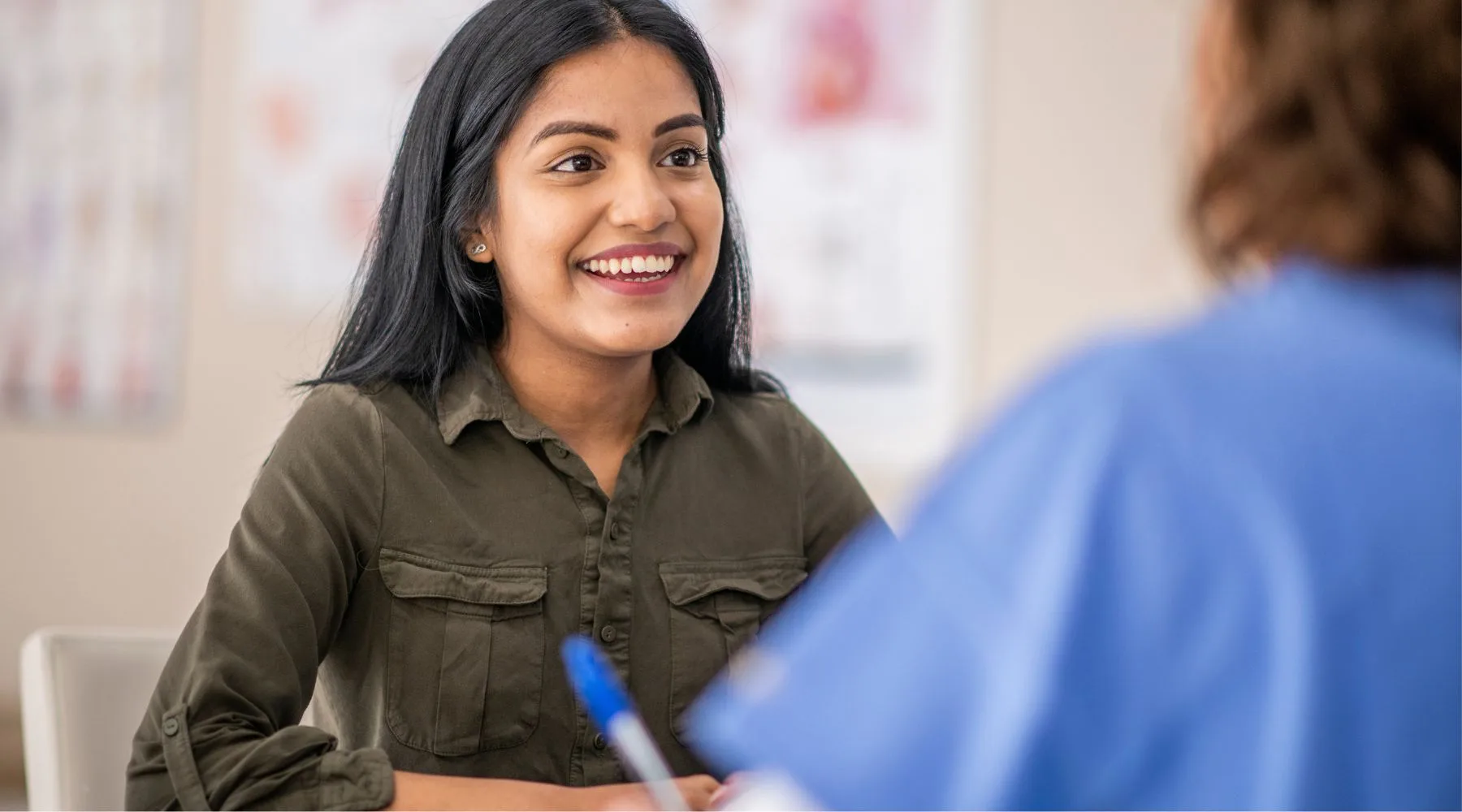 Young_Woman_Speaking_To_Doctor_Canva_1800x1000 Young_Woman_Speaking_To_Doctor_Canva_1800x1000