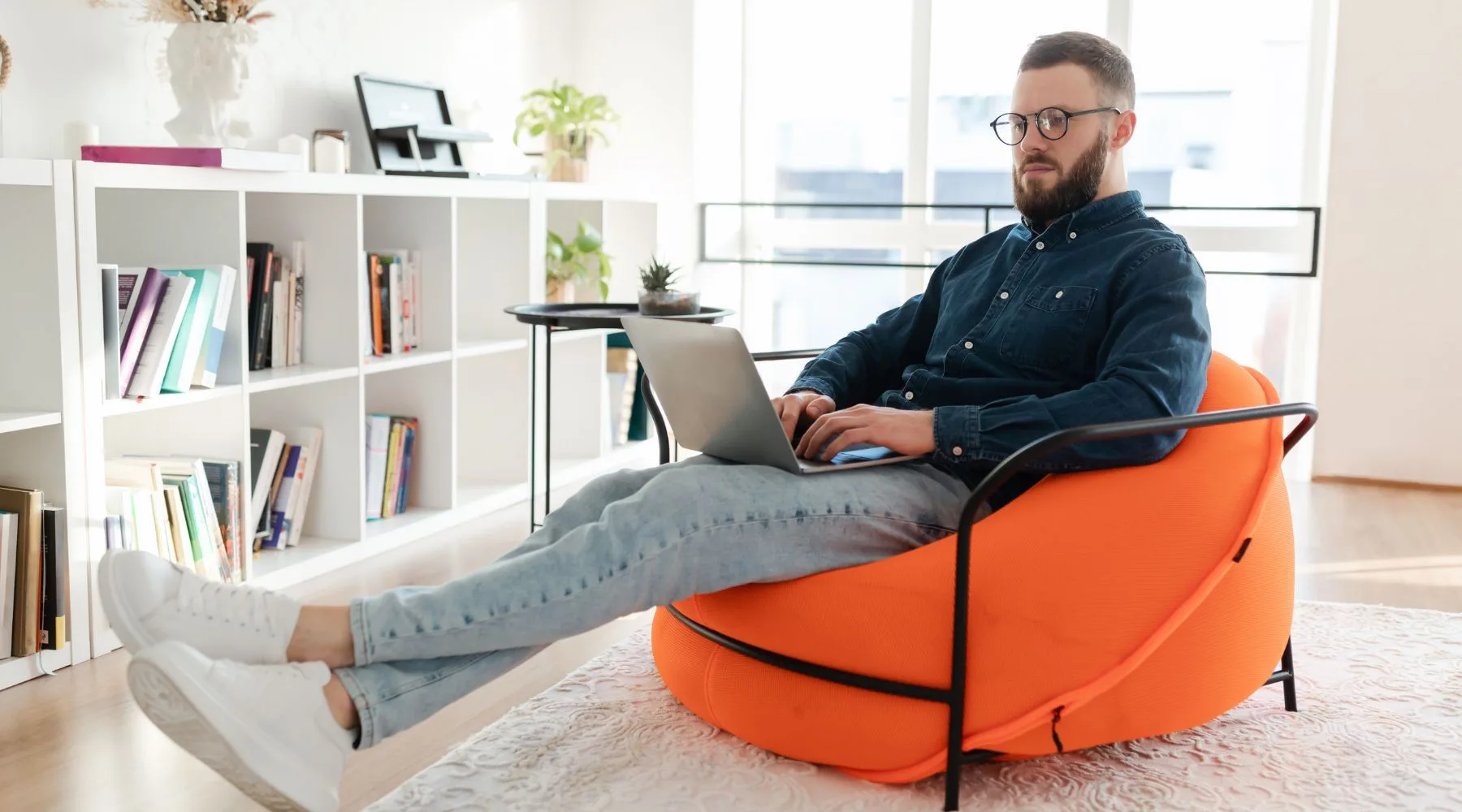 Man_Browsing_Online_Canva_1800x1000 Man_Browsing_Online_Canva_1800x1000