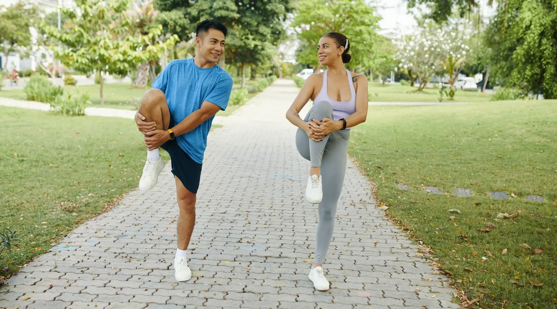 Couple_Exercising_In_Park_Canva_1800x1000