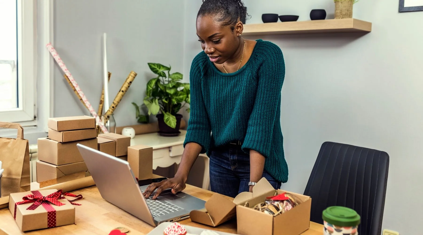 Female_Business_Owner_Checking_Emails_Canva_1800x1000 Female_Business_Owner_Checking_Emails_Canva_1800x1000