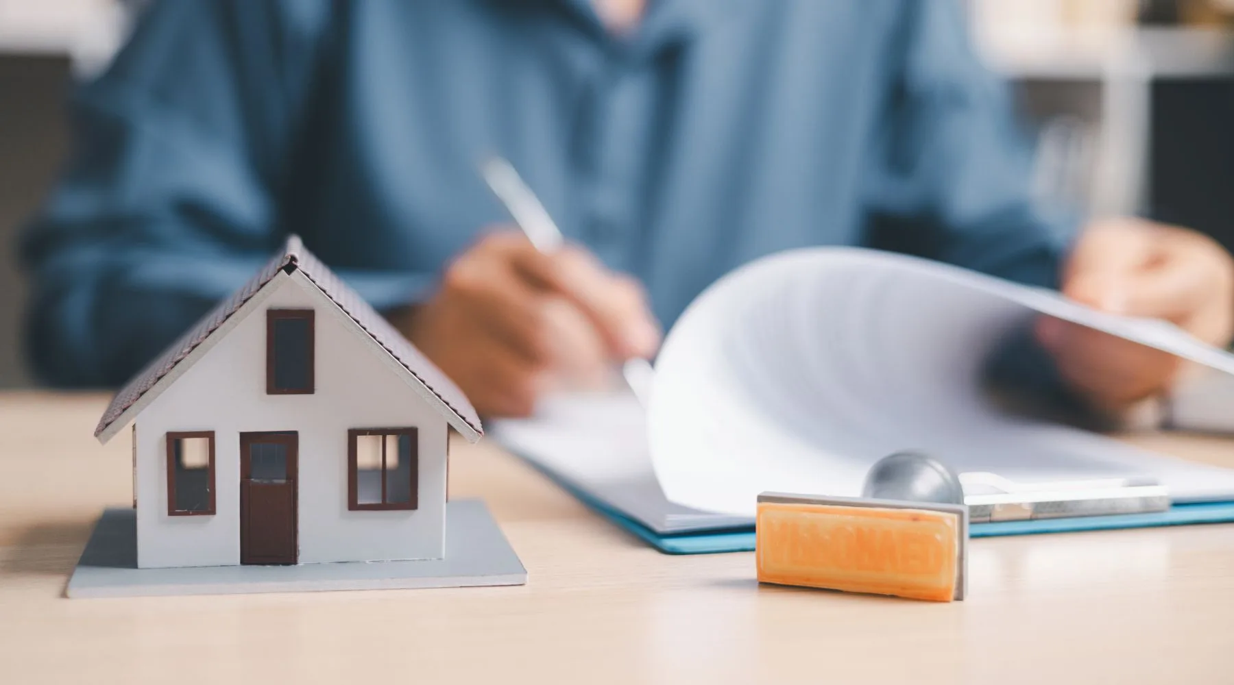 Model_House_On_Desk_Contract_Canva_1800x1000