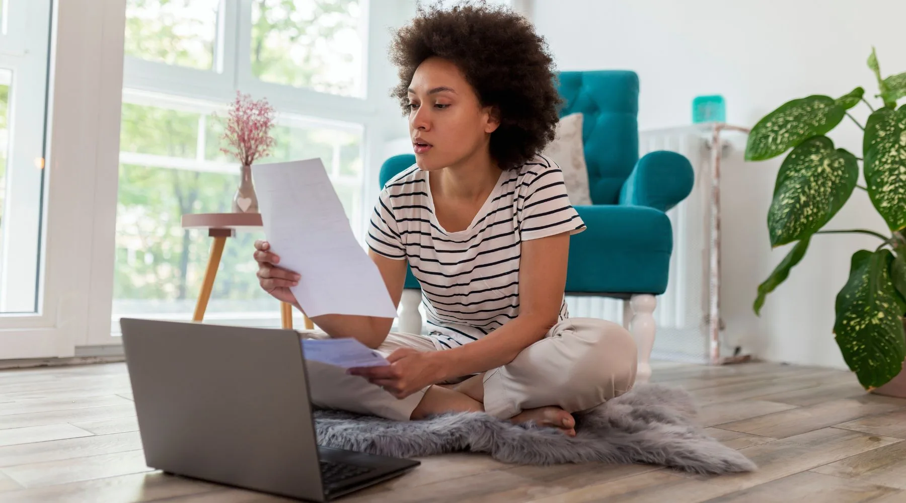 Woman_Checking_Energy_BIlls_Online_Canva_1800x1000 Woman_Checking_Energy_BIlls_Online_Canva_1800x1000