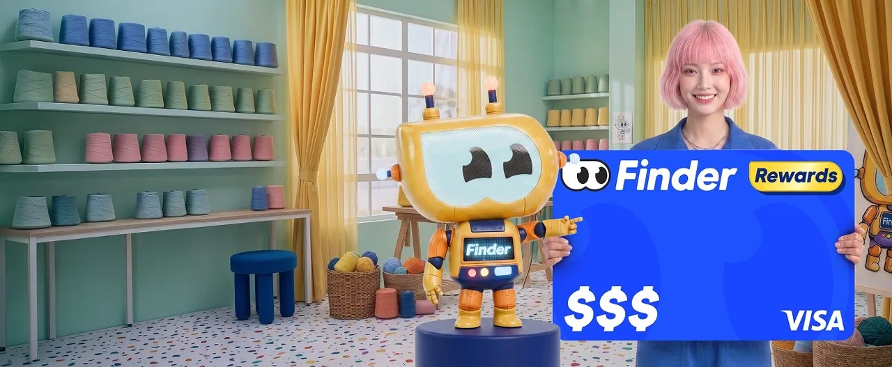 Woman holding a Finder Rewards Visa gift card next to the Finder robot