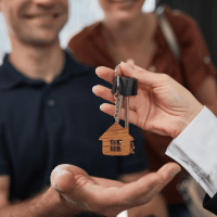 Image: Supplied House key handed to new owners