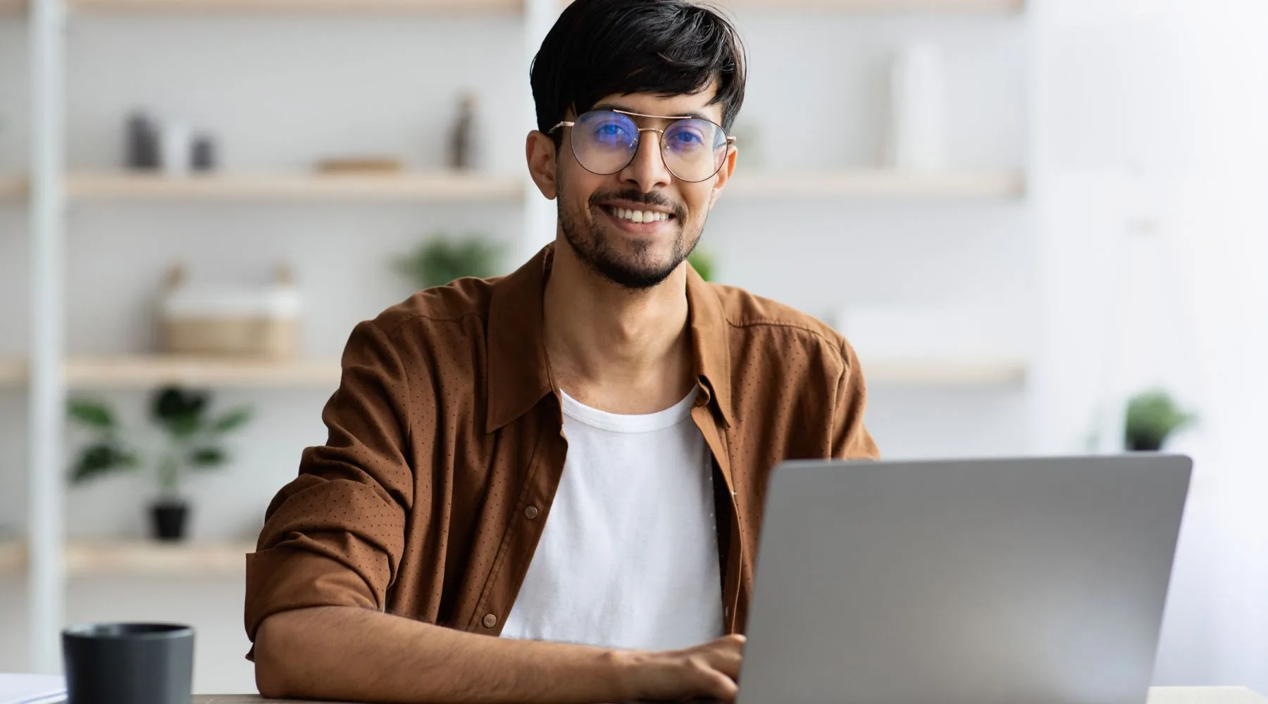 Successful_Man_Working_On_Laptop_Canva_1800x1000 Successful_Man_Working_On_Laptop_Canva_1800x1000