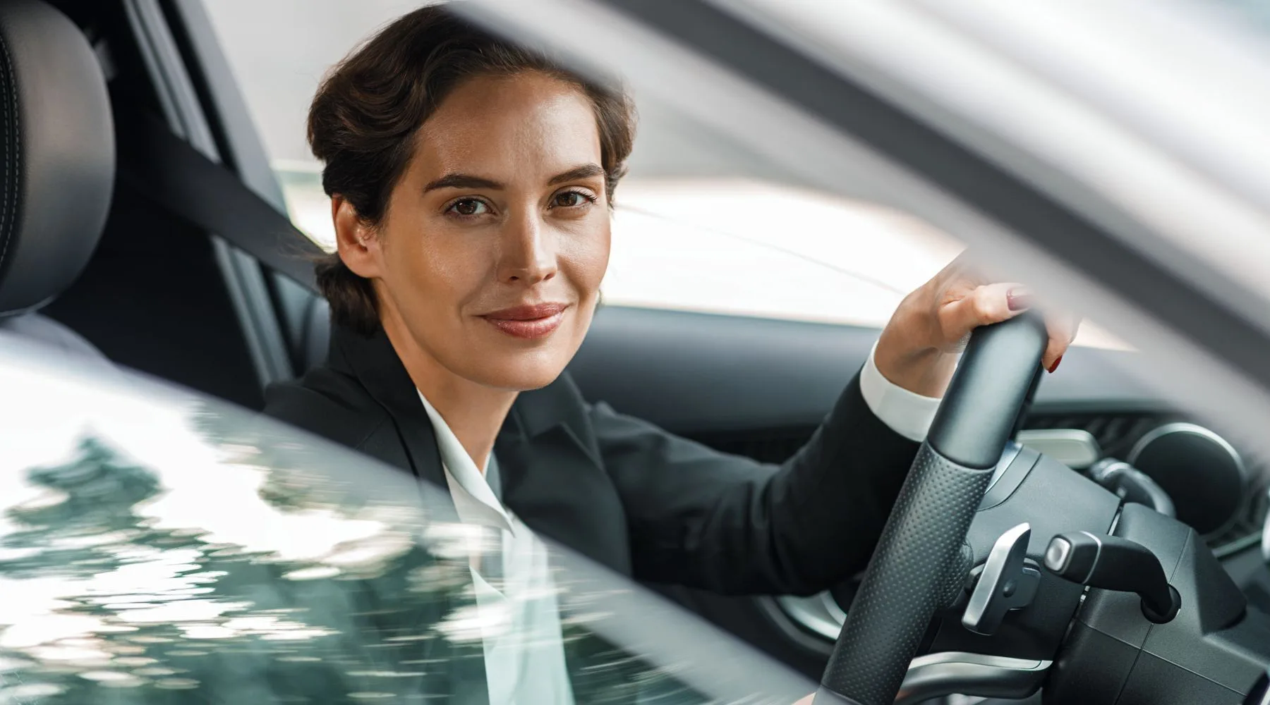 Woman_Driving_Car_Canva_18000x1000